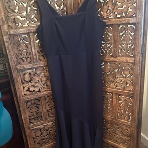 Elegant Dark Navy Blue Sleeveless  midi Dress with a trumpet flared skirt